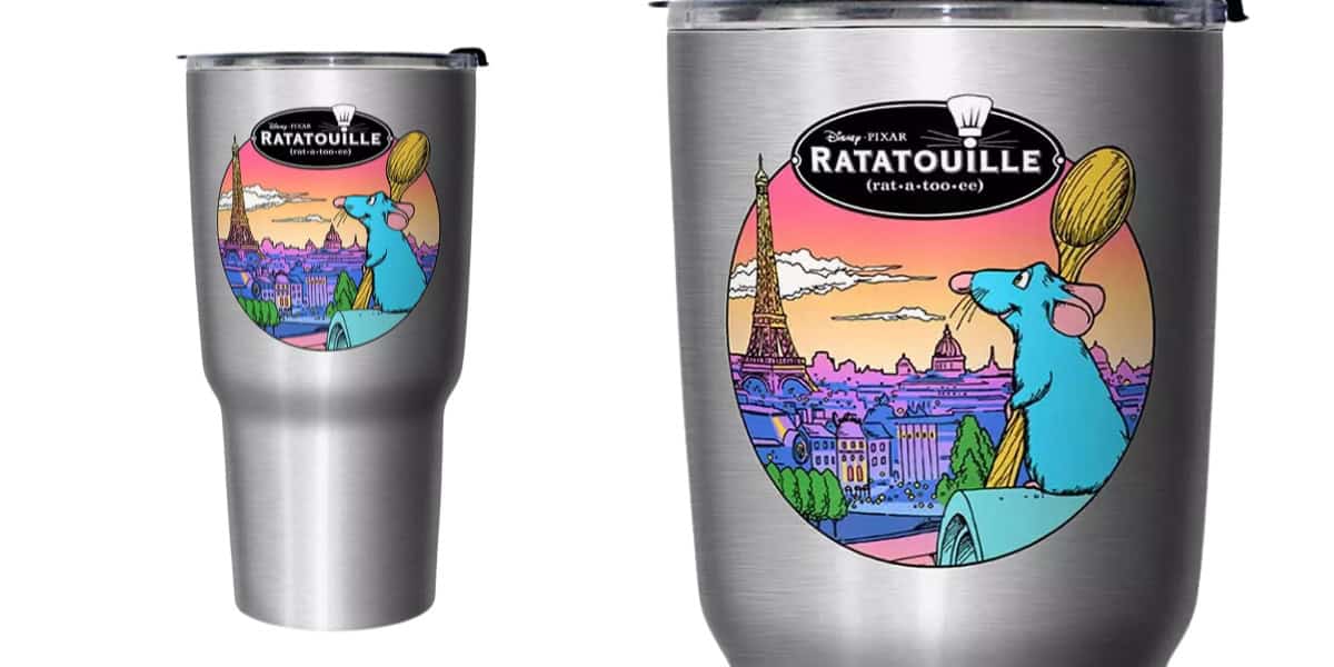 A silver tumbler featuring an illustration of a blue rat wearing a chef's hat, with the Eiffel Tower and Paris skyline in the background. The design includes the text "Ratatouille" and resembles artwork from the animated film.