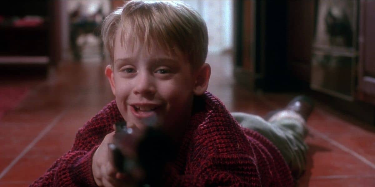 Kevin McCallister (Macaulay Culkin) with a gun in 'Home Alone'