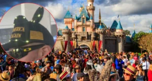 A large crowd gathers in front of a fairy tale castle with blue turrets. In a circular inset, a person wears a dark cap with gold embroidery, including the text "America Again." The scene is bright and vibrant with a partly cloudy sky.