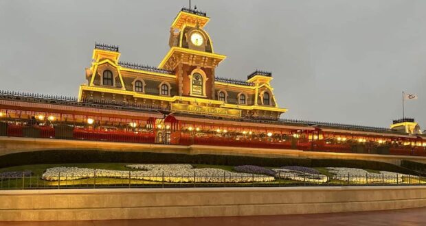 The train station at the entrance to Magic Kingdom Park in the rain.