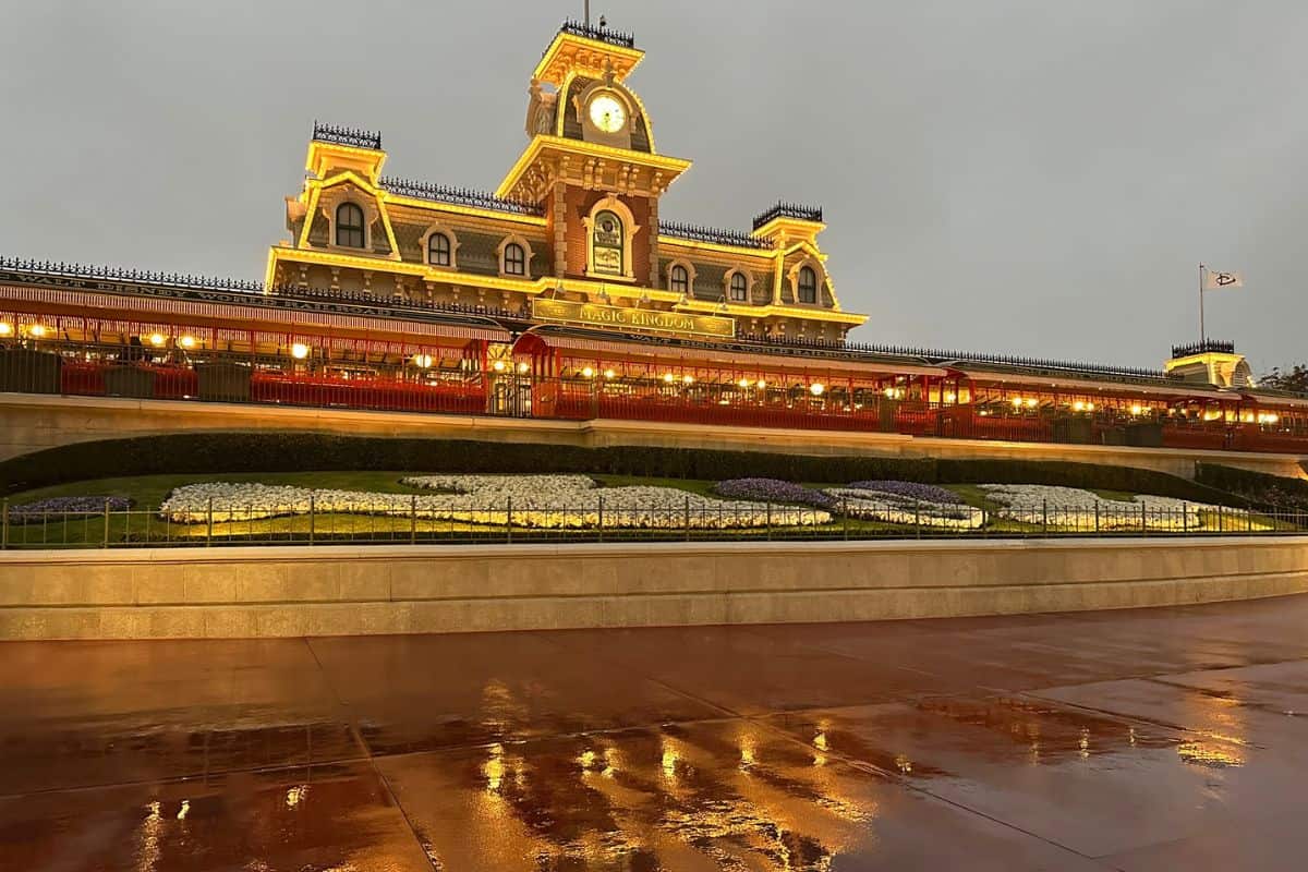 The train station at the entrance to Magic Kingdom Park in the rain. 