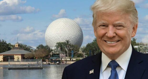 A man in a suit stands smiling by the water's edge, with Epcot's iconic geodesic sphere and surrounding buildings in the background. The sky is partly cloudy, adding to the charm of this World Showcase scene.