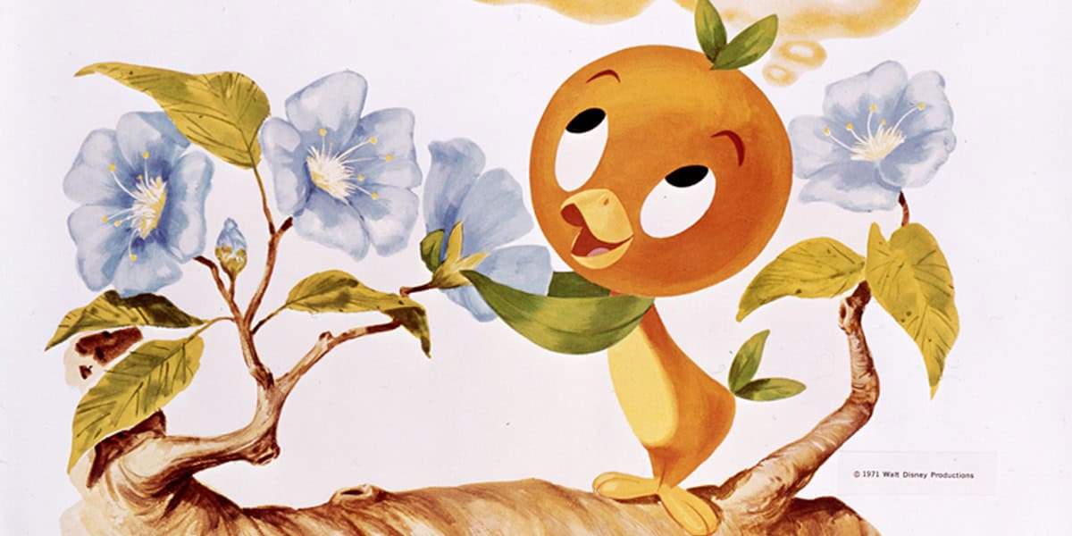 Cartoon of a cheerful orange bird with green leaves on its head and neck, standing on a branch with large blue flowers. The bird looks upward with a smile against a plain background.
