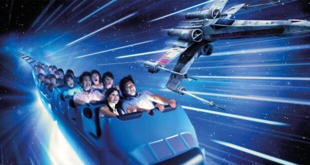 Guests ride Hyperspace Mountain at Hong Kong Disneyland