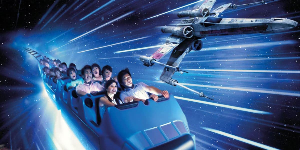 Guests ride Hyperspace Mountain at Hong Kong Disneyland