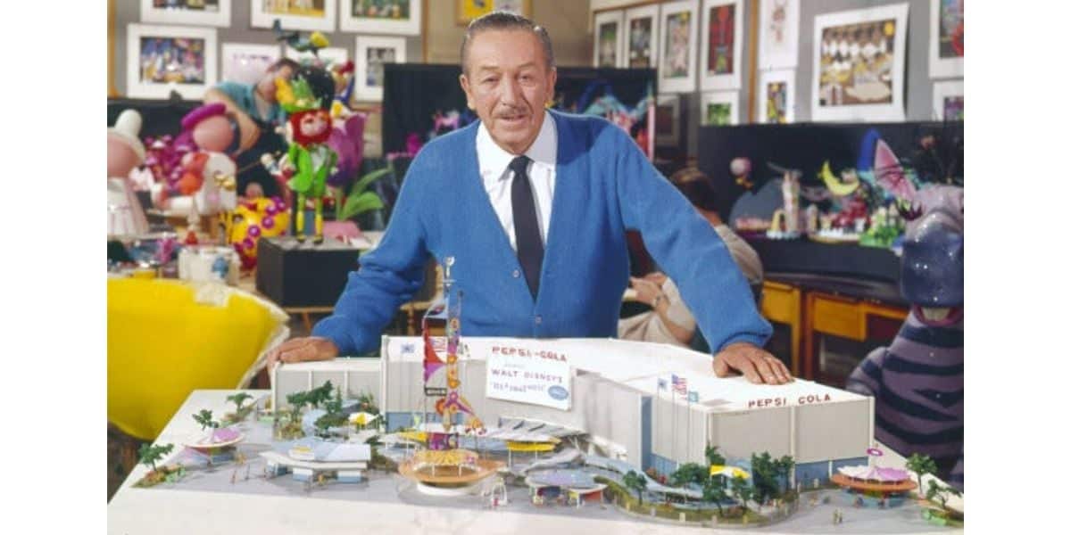 Walt Disney with a model of "it's a small world"