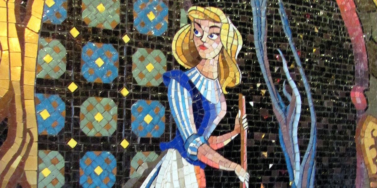 Mosaic artwork depicting Cinderella in a blue and white dress, holding a broom, with a patterned background of blue, yellow, and brown tiles—echoing the style seen in Disneyland murals created by the Nazi behind Disney World’s iconic art.
