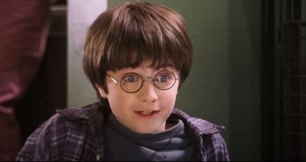 Harry talking to the snake in 'Sorcerer's Stone'