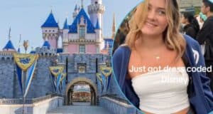 A woman in a white tube top that violated the Disney Dress code next to Sleeping Beauty Castle