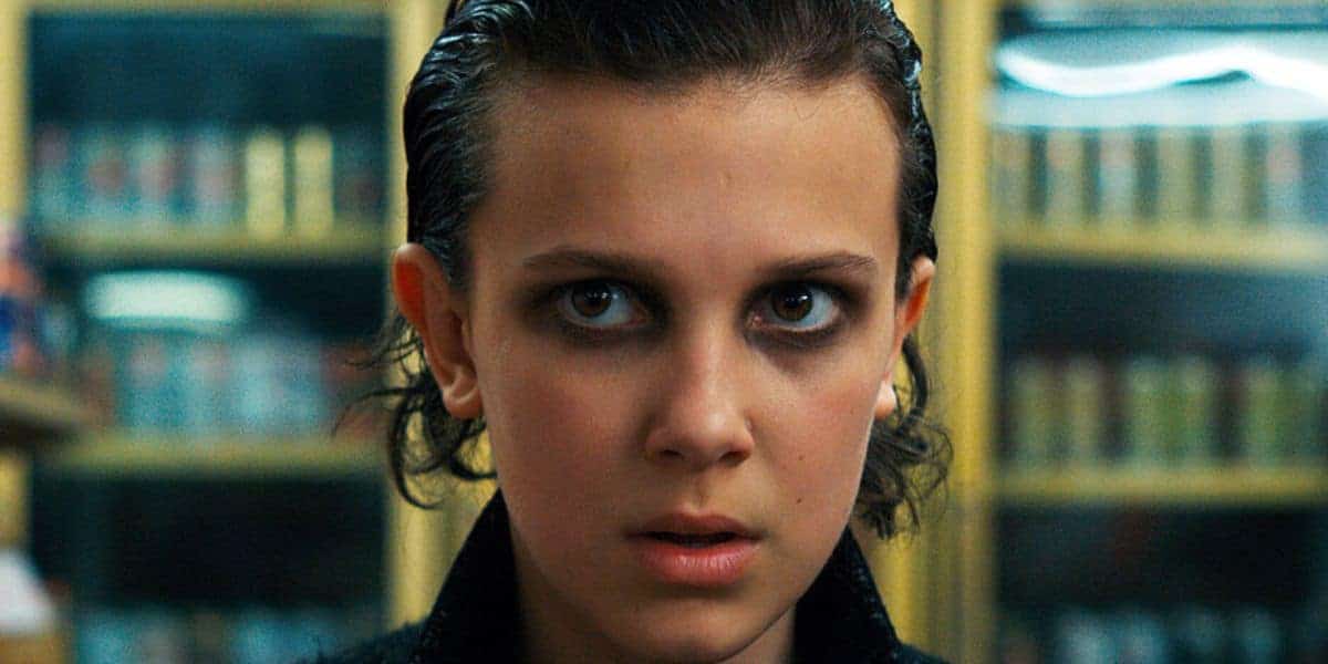 Millie Bobby Brown as Eleven with slick back hair
