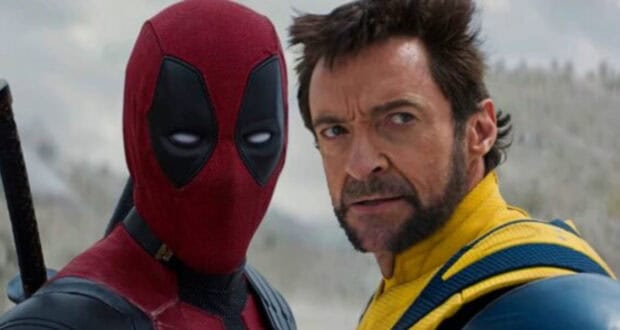 Deadpool (Ryan Reynolds) and Wolverine (Hugh Jackman) standing together.