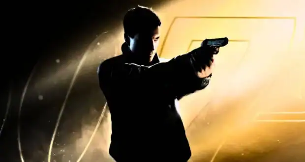 A man stands in dramatic lighting, holding a gun with both hands and aiming to the right. The background features yellow and black tones with the faint outline of the numbers "007.