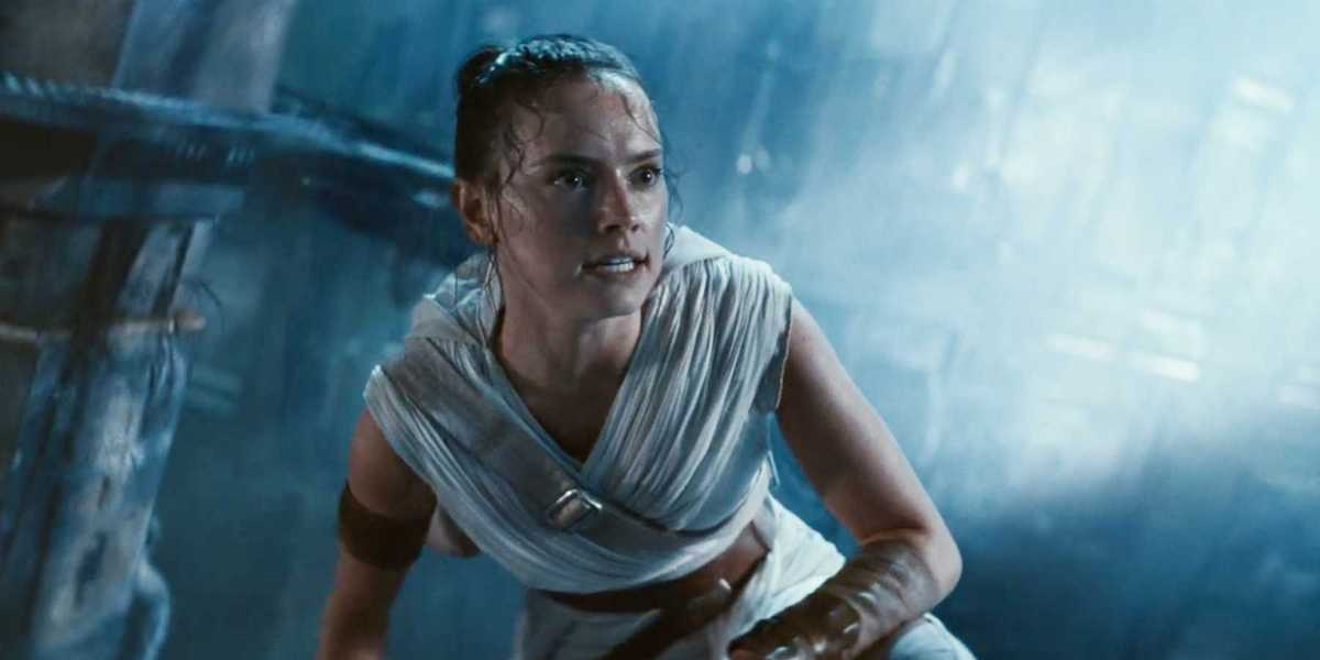 Rey (Daisy Ridley) crouching in 'The Rise of Skywalker'