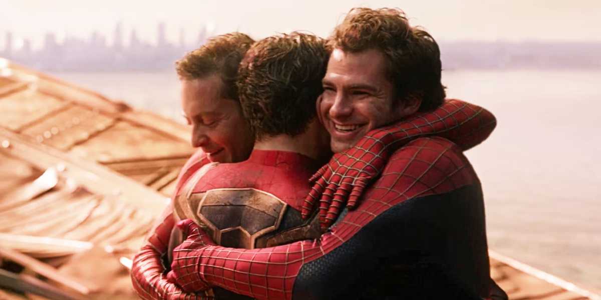 Andrew Garfield, Tobey Maguire and Tom Holland as Peter Parkers hugging