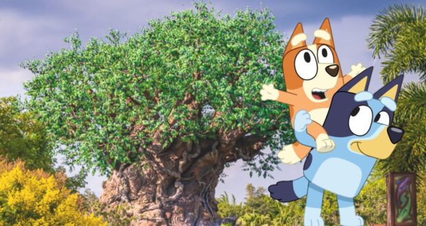 Bluey and Bingo greet fans in front of Animal Kingdom’s Tree of Life, surrounded by lush greenery—a Disney must-see for families.