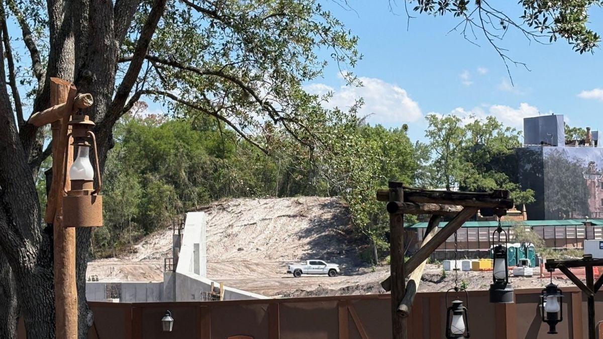 Piston Peak construction at Magic Kingdom, with lanterns and construction walls rising to separate the area from Big Thunder Mountain.