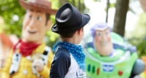 A young guest meets Woody and Buzz Lightyear at Walt Disney Studios Park