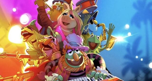 The Muppets perform live on a vibrant stage at a theme park, playing instruments and delighting the audience with their energy.