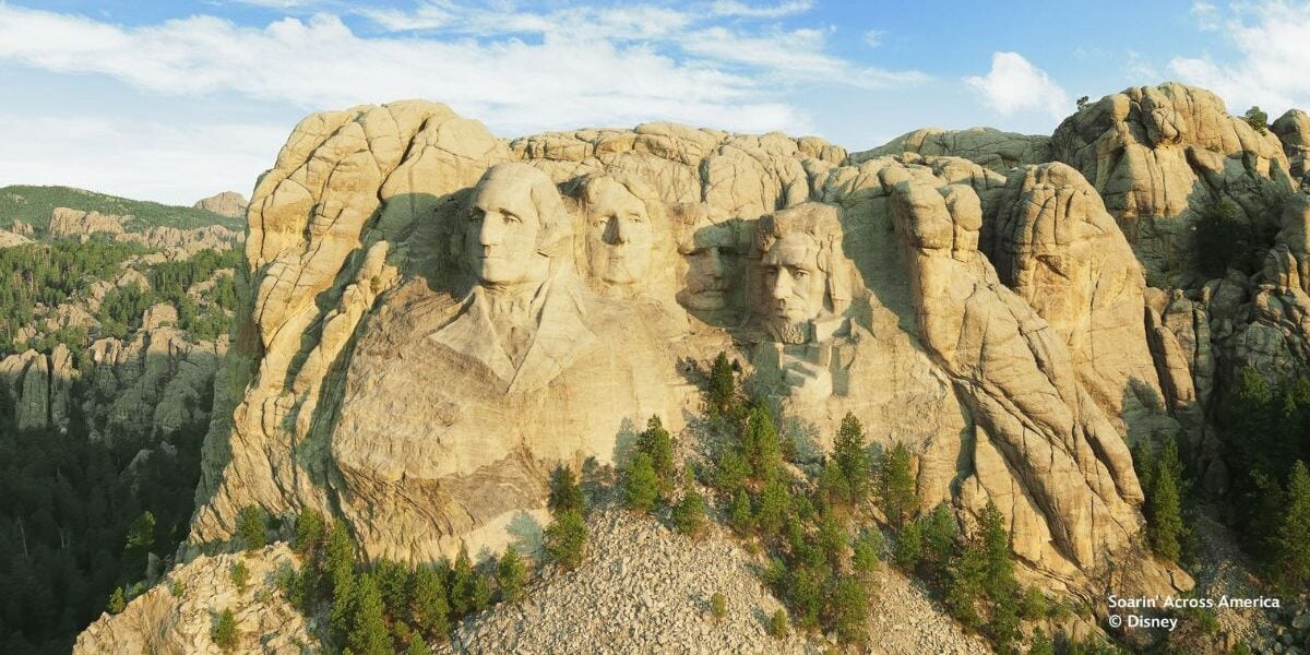 Mount Rushmore featured in Soarin’ Over America’s new anniversary update, prompting park fans to debate its controversial inclusion.