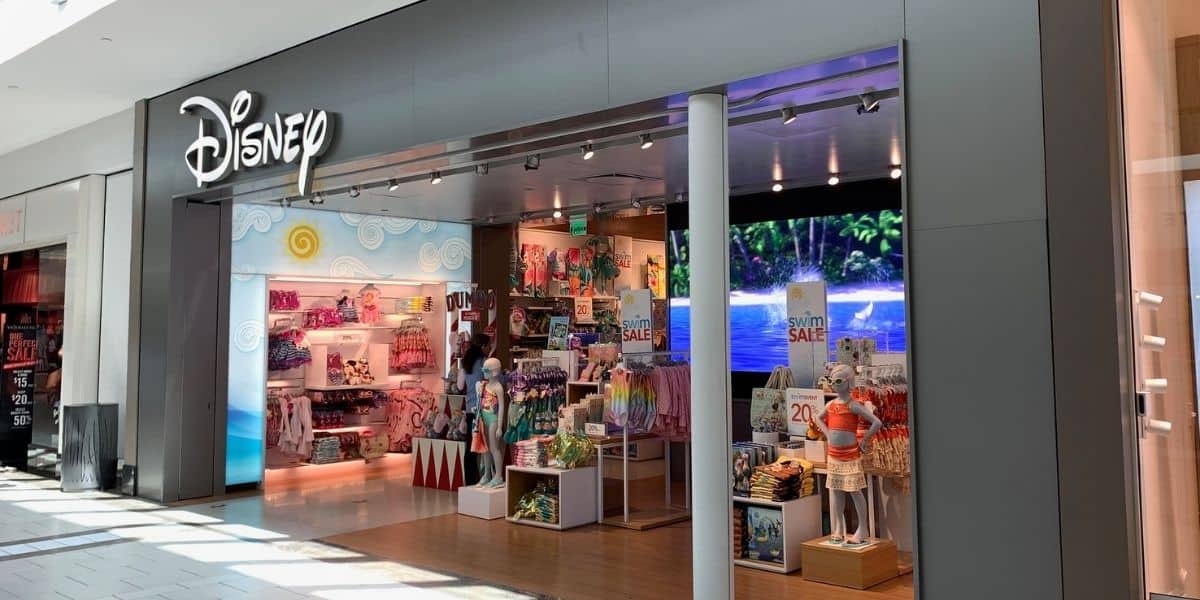 Disney Pop Up Store returns to the mall, decked out in vibrant Disney merch and sale signs—fans wonder if it's here to stay.