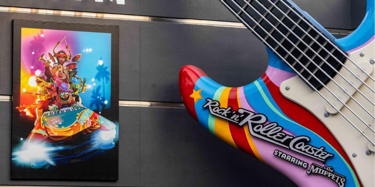 The Muppets cruise by a giant guitar with Statler and Waldorf in a lively mural at Rock 'n' Roller Coaster, Hollywood Studios.