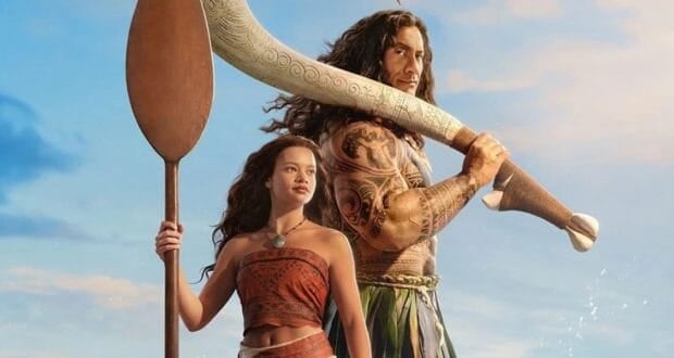 Moana and Maui pose together with Moana’s paddle and Maui’s magical hook, set against a sunny, vibrant sky.