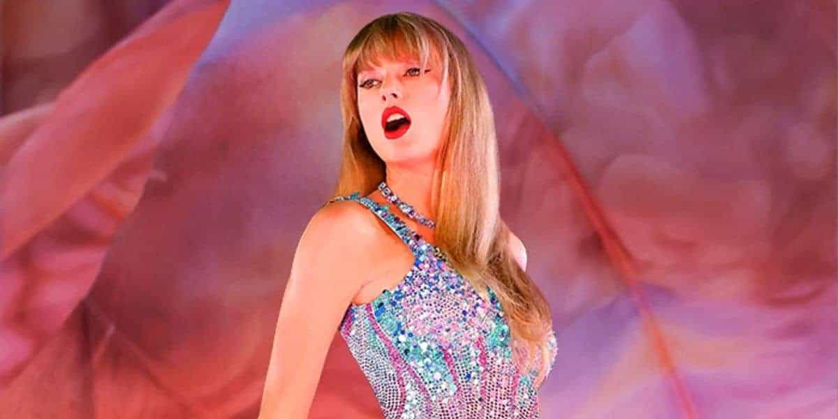 A performer in a glittering dress dazzles on stage amid vibrant lights, evoking the thrill of a Disney Parks live show reveal.