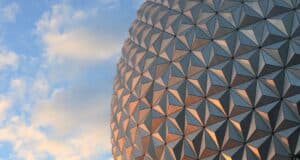 Spaceship Earth against a cloudy sky.