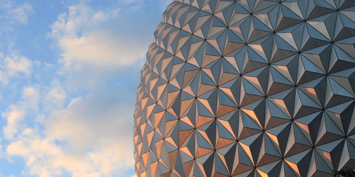 Spaceship Earth against a cloudy sky.
