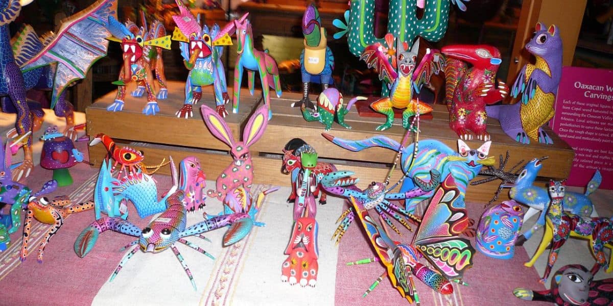 Vibrant Oaxacan wood animal figurines in the EPCOT World Showcase Mexico Pavilion