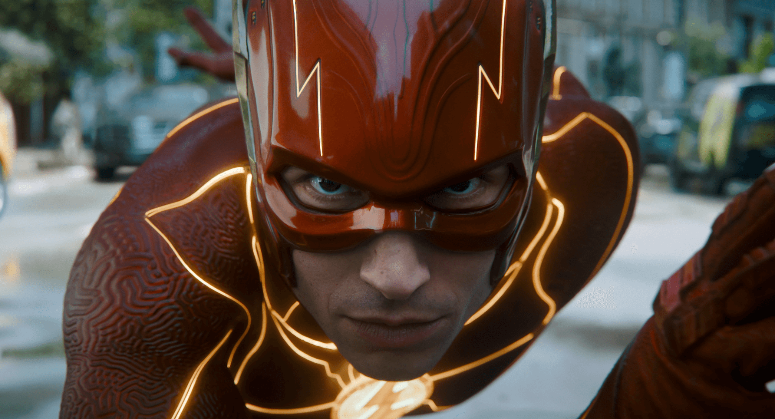 Fast-paced superhero in the Flash costume preparing to race, urban background, detailed costume design with glowing accents, close-up action shot from DIVO Post Production, high-quality visual effects and color grading.