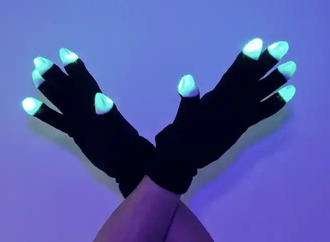 Glowing LED fingernails with black gloves, perfect for DJ Dumplings' vibrant lighting shows.