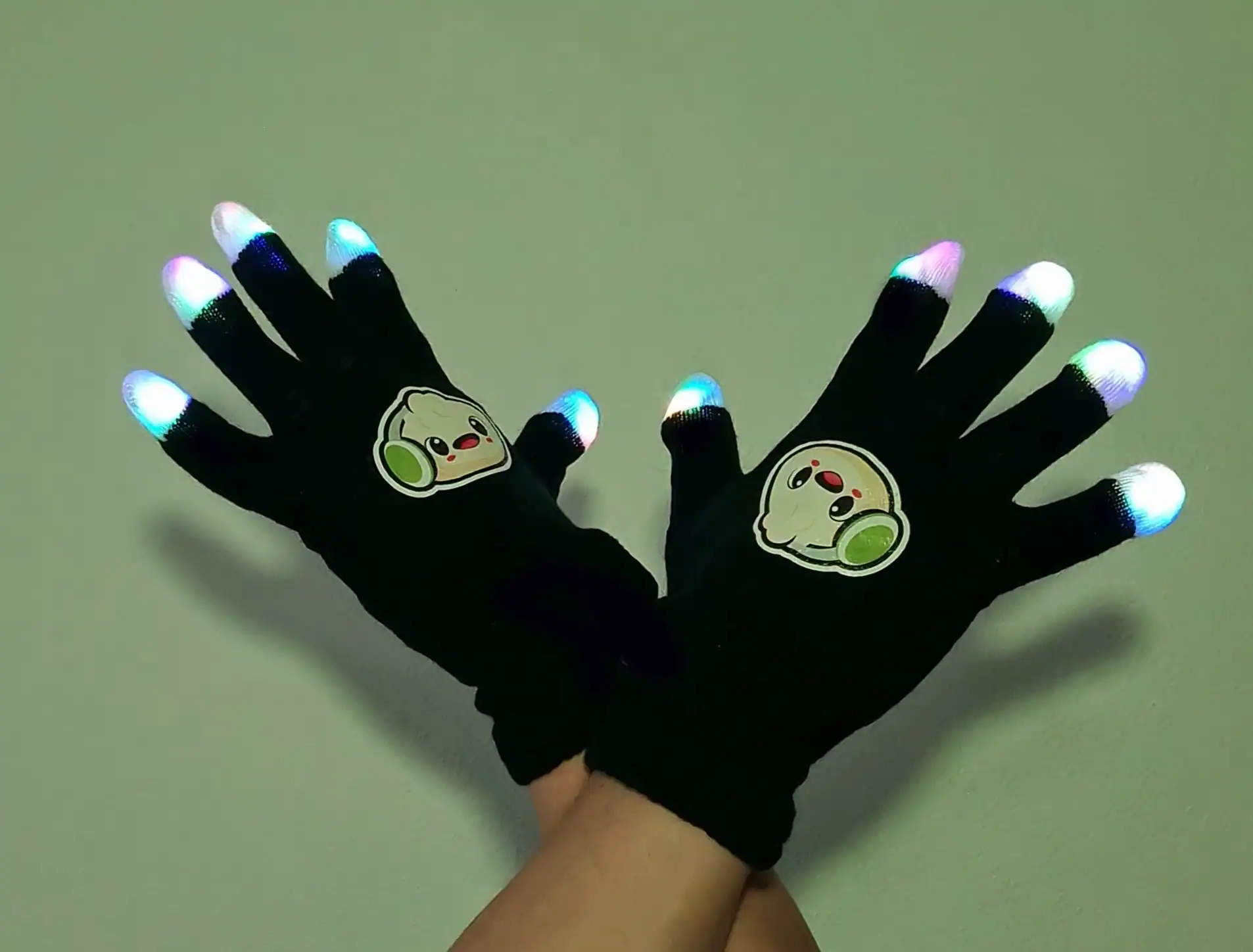 Glow LED gloves with kawaii dumpling logo for DJ Dumplings party accessories.