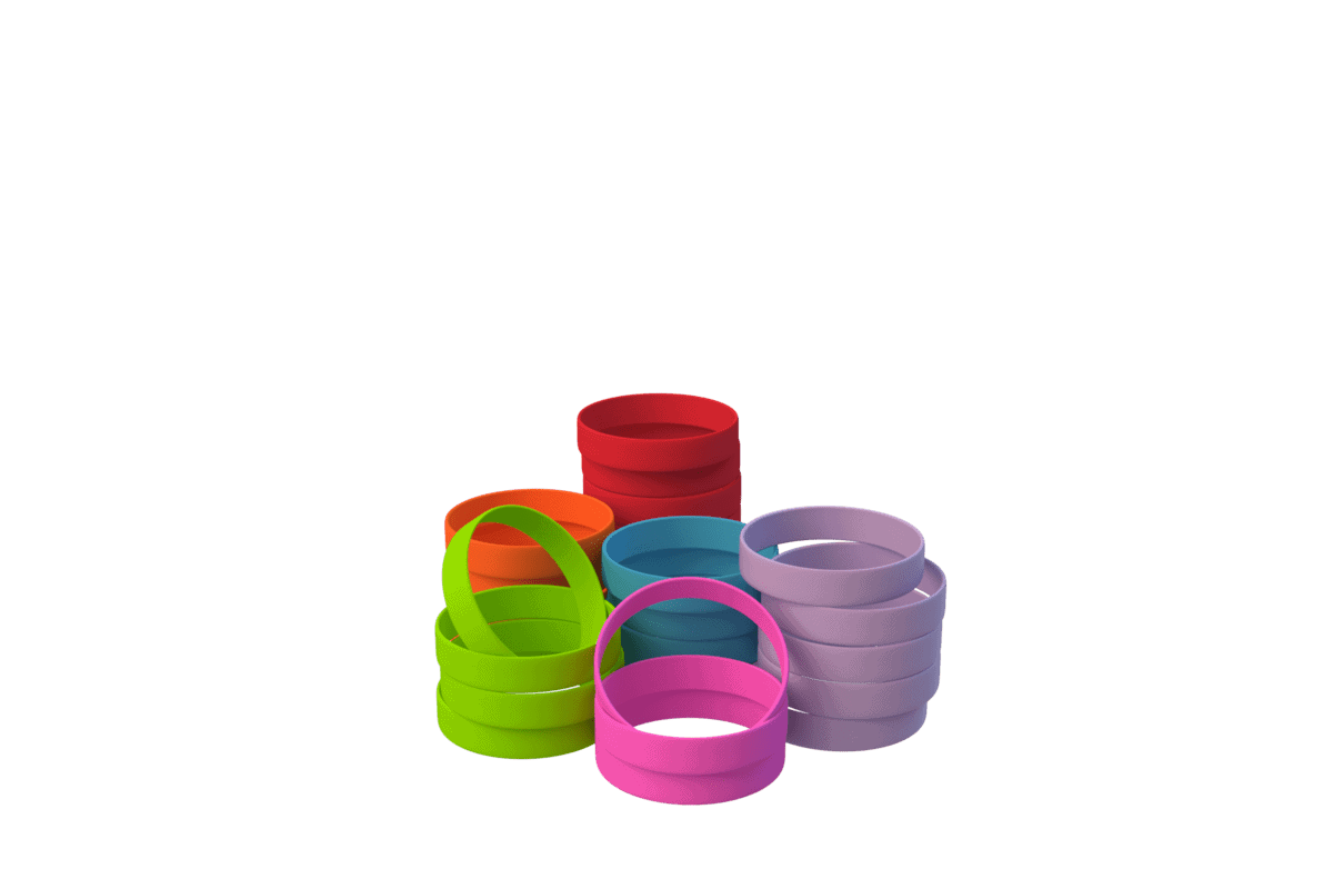 Stabler af farverige silikonearmbånd i forskellige farver.