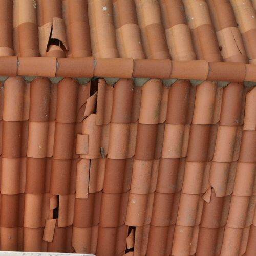visible hail damage on a tile roof