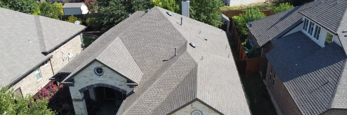 Residential roof replacement inspection with durable shingles, representing roofing companies in San Antonio TX, and honoring historical Dolan Roofing