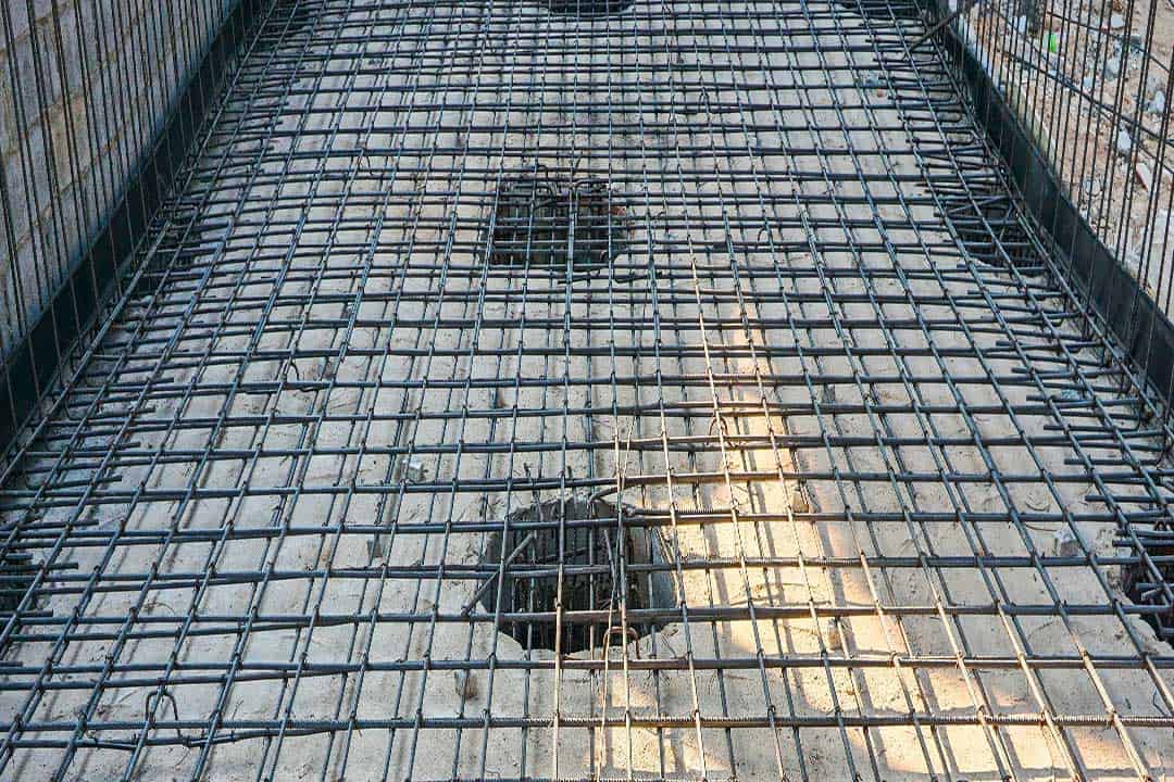 Pool steel reinforcement grid showing precise structural alignment