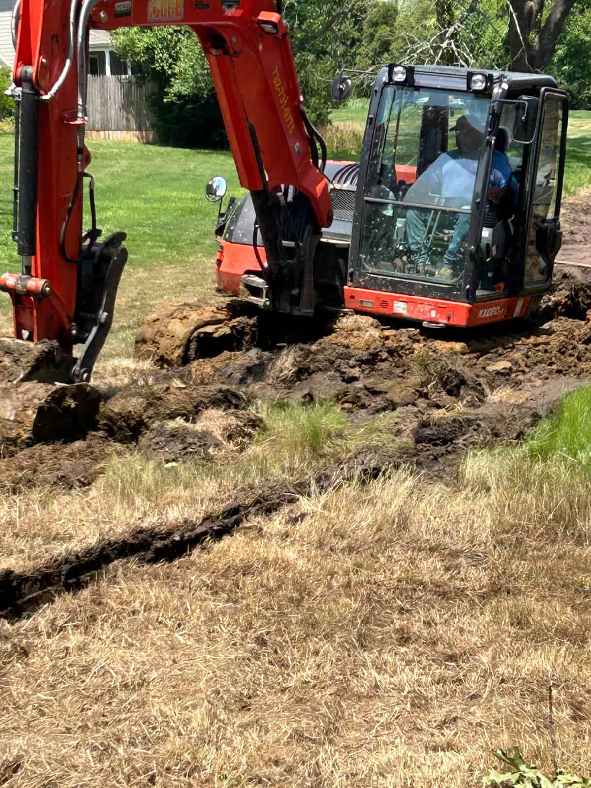 Drain Jetters R Us machinery efficiently handling excavation tasks.
