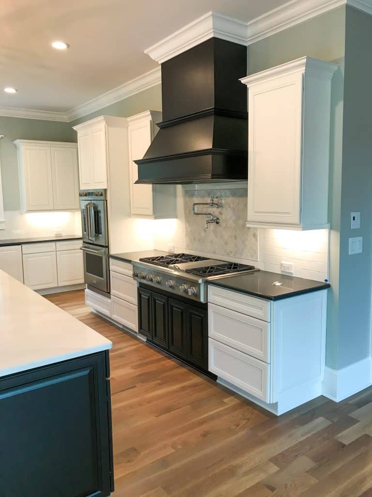 Built-in cabinetry with interior accent lighting