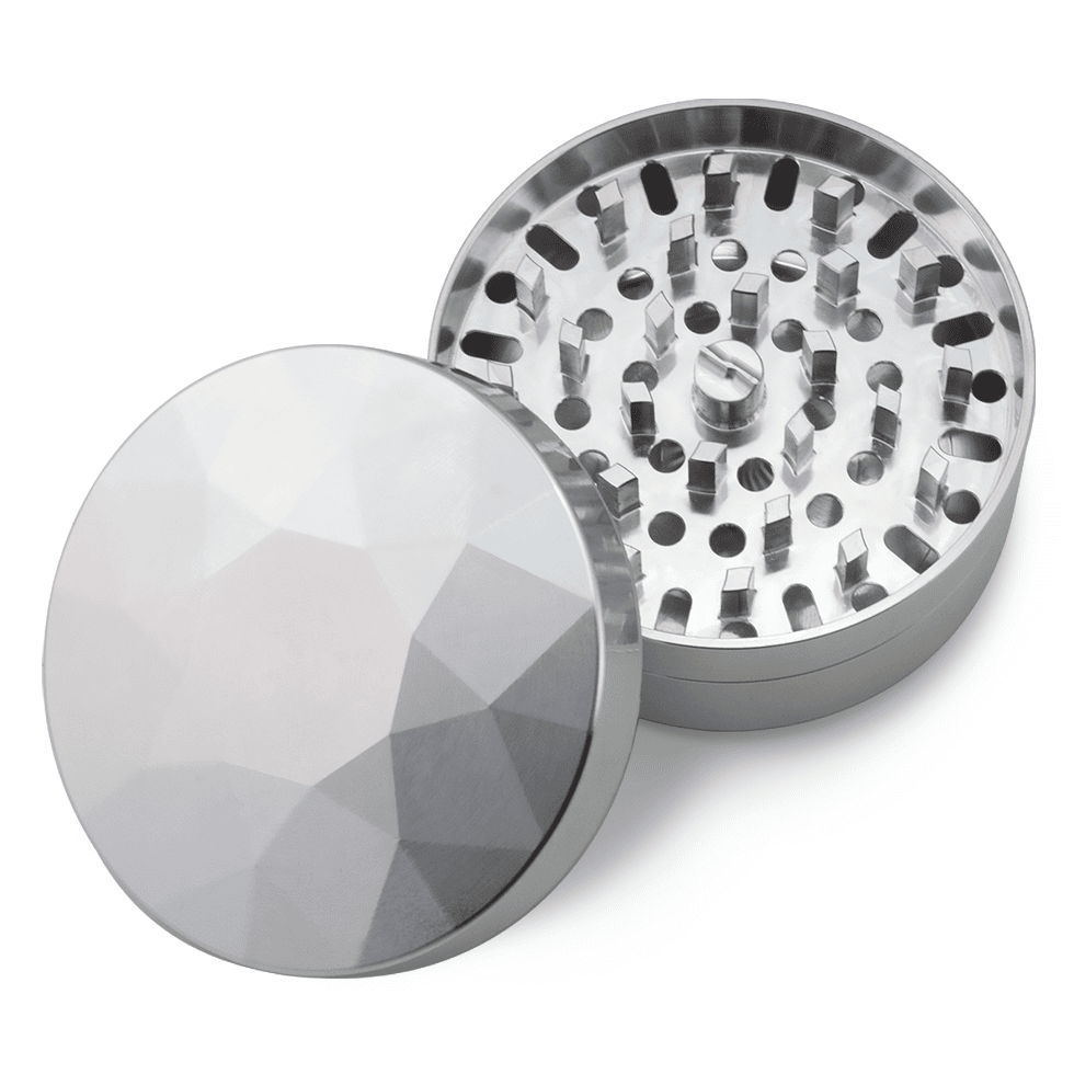 Brilliant Cut Grinder in silver, open to show cutting teeth and geometric lid design