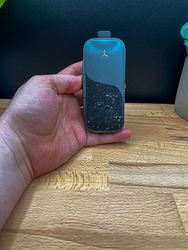 AirVape Legacy Pro 2 Review: vaporizer with dry herb chamber exposed on wood table