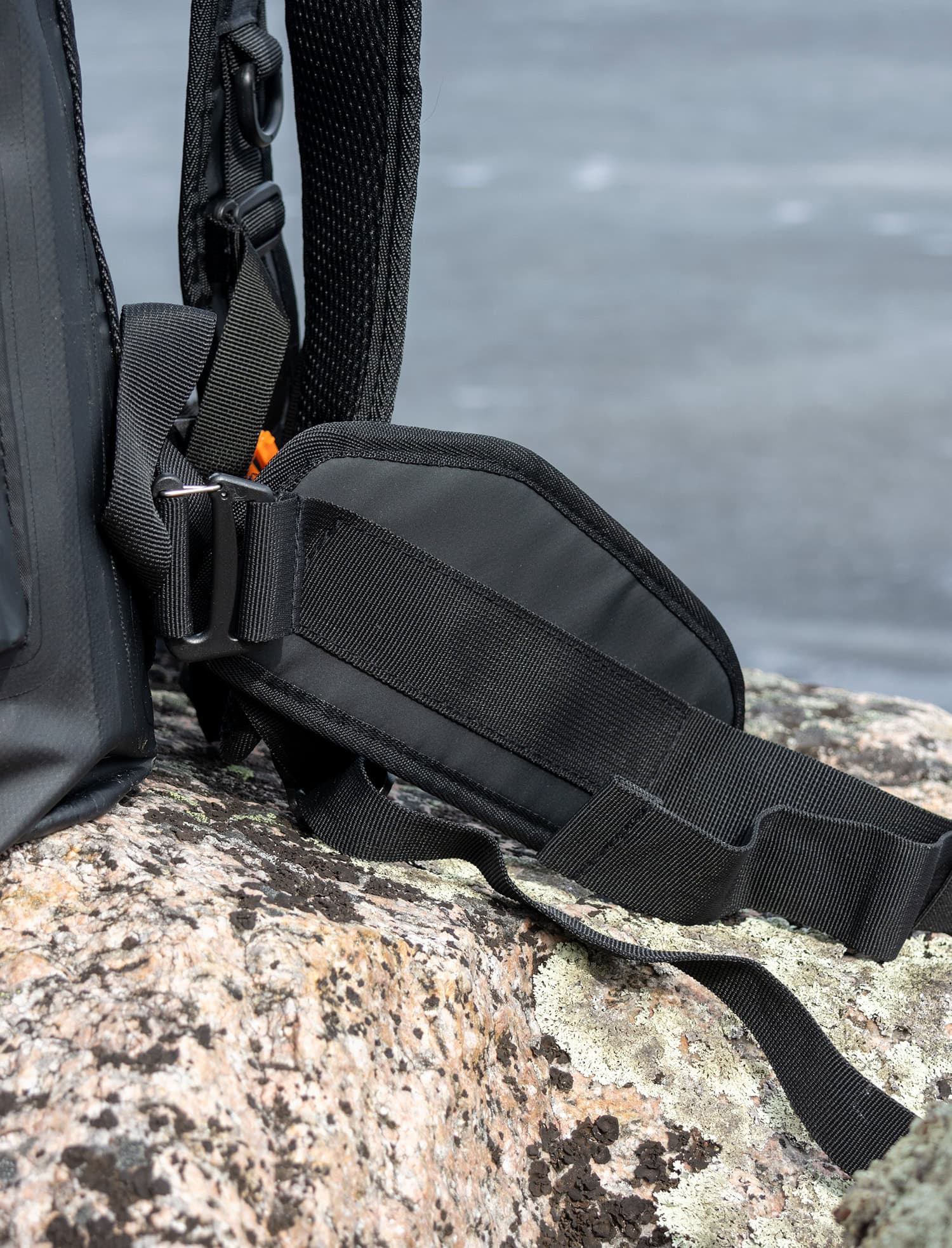 Waterproof backpack with adjustable strap and secure closure, ideal for outdoor adventures.