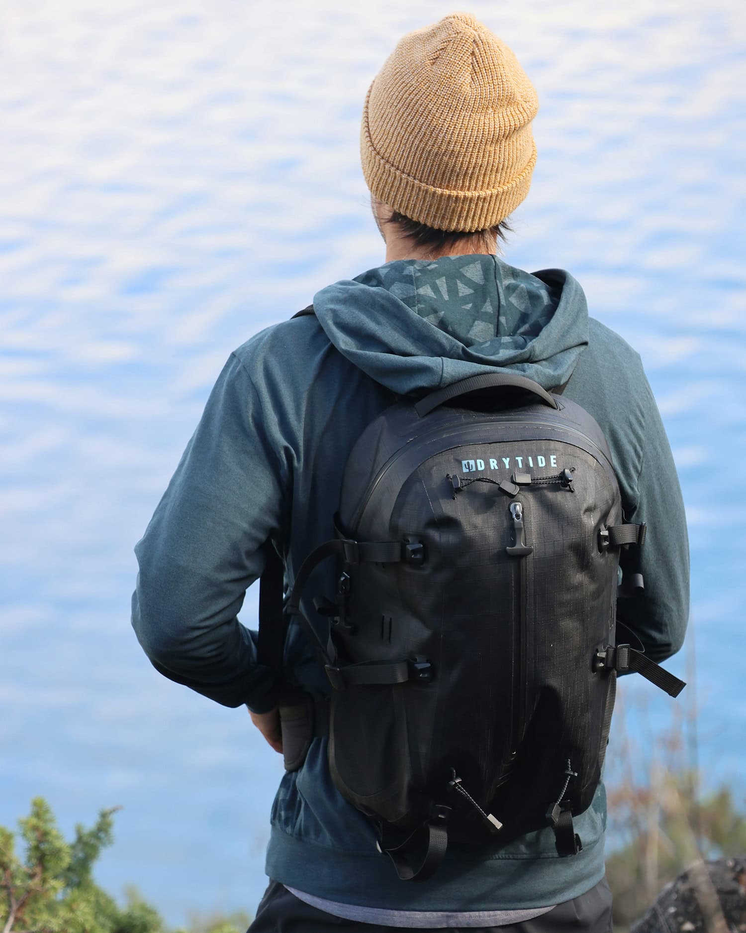 Waterproof backpack designed for outdoor activities, perfect for hiking and water sports.