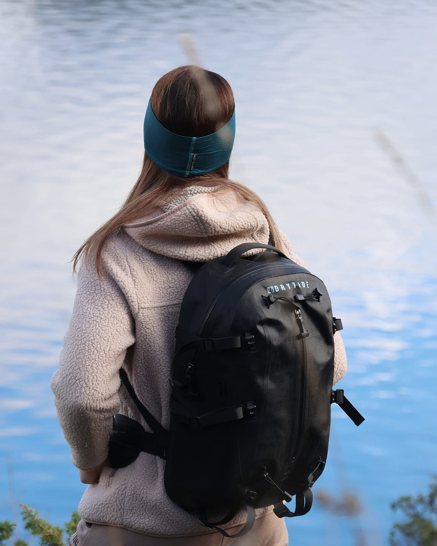 Waterproof backpack designed for outdoor activities, featuring durable materials and secure compartm.