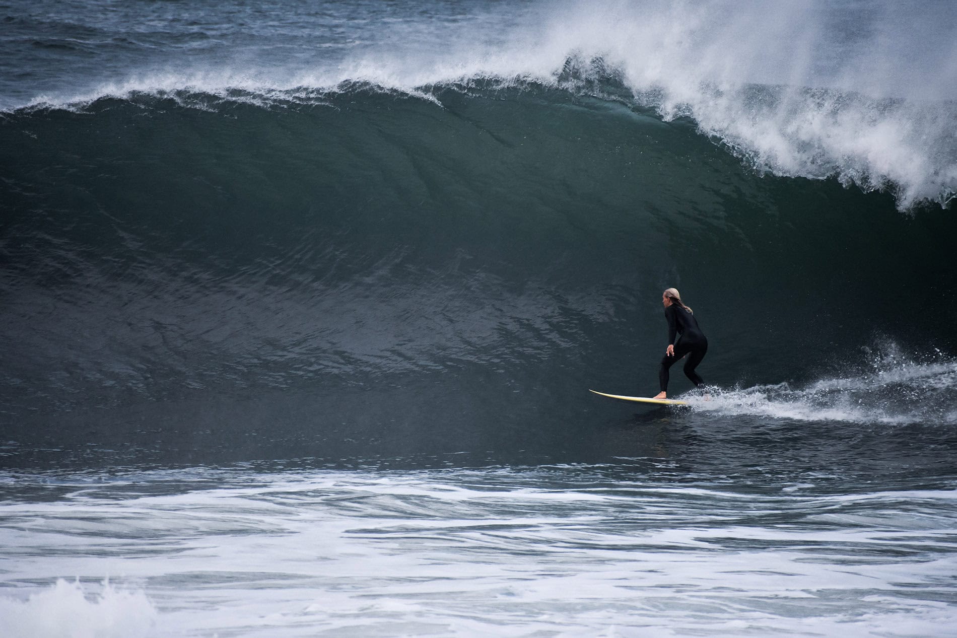 Overhead, clean and in a wetsuit, just like it should be.