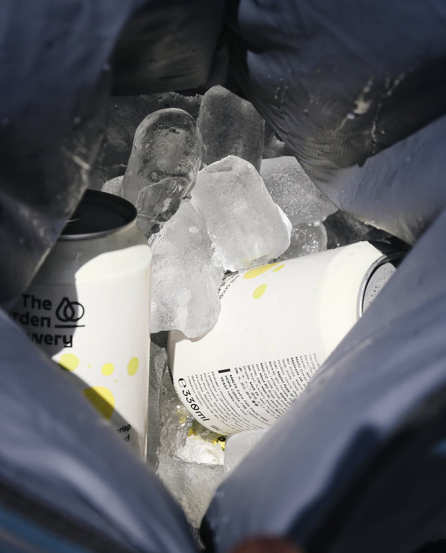 Cooler dry bag filled with ice and cans
