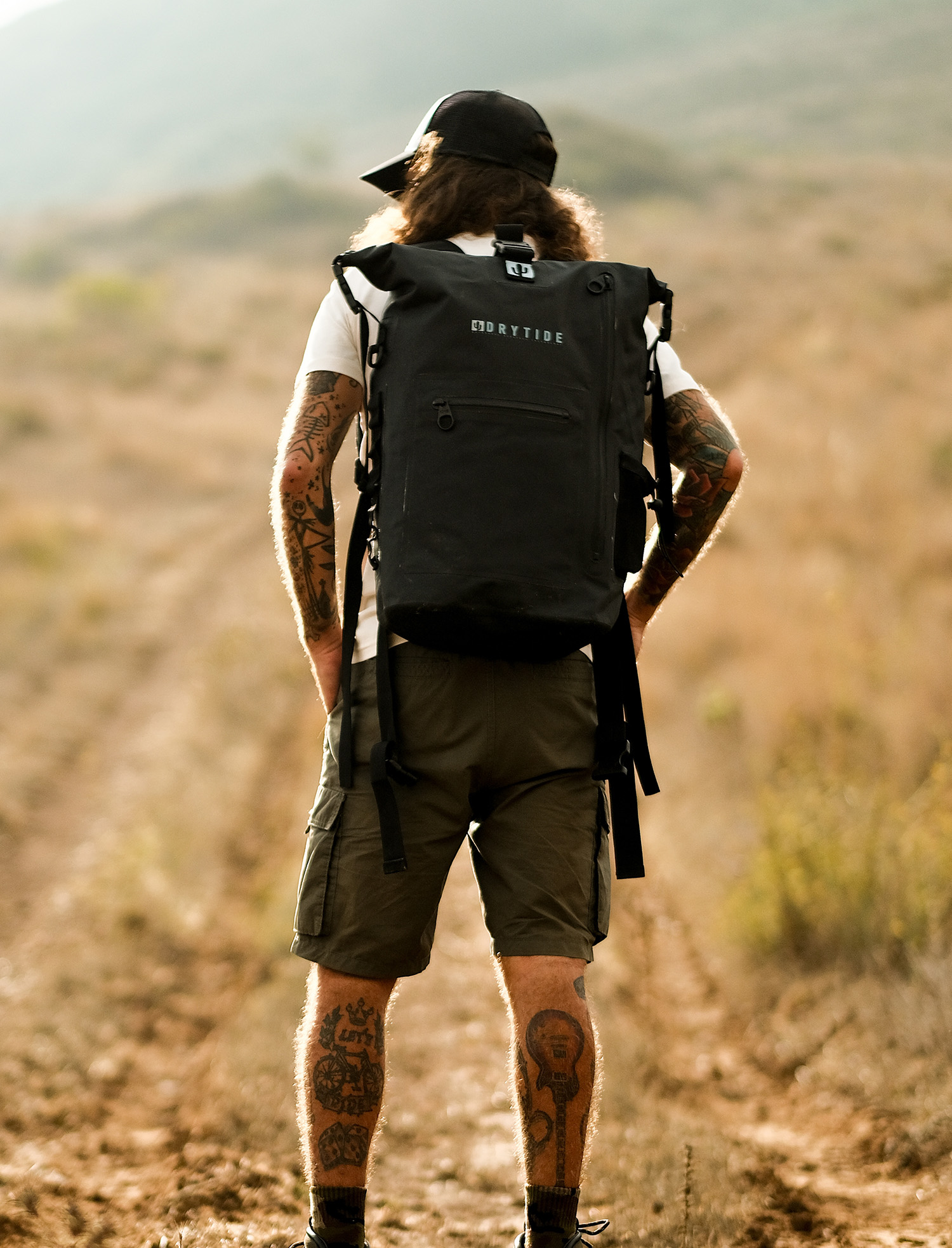 Waterproof backpack for outdoor adventures, hiking, and travel by Drytide Gear. Durable, water-resis.