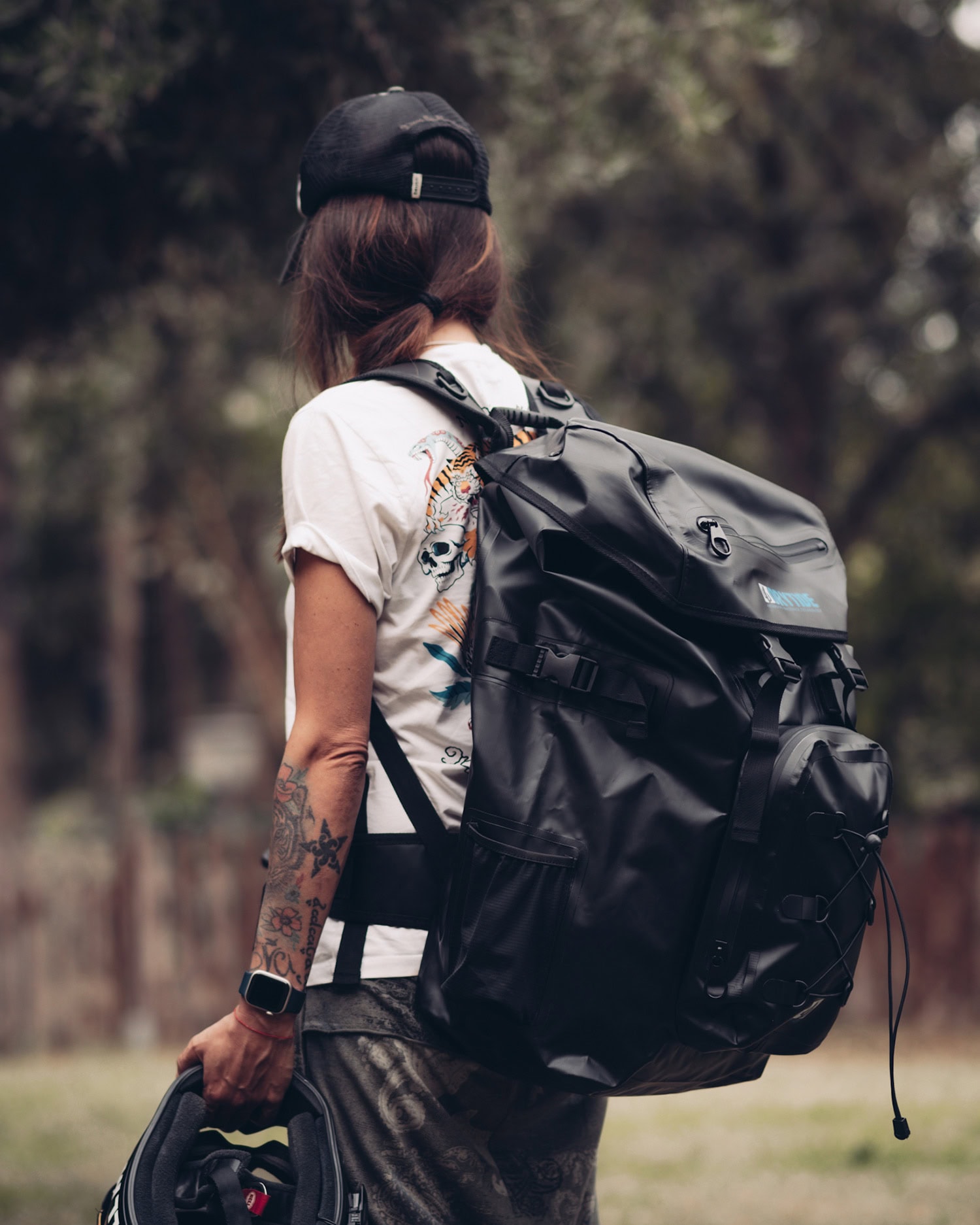 DryTide 50L travel backpack biker