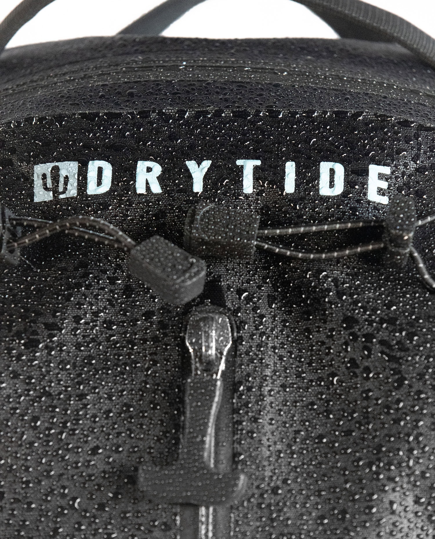 Drytide waterproof backpack zipper close-up.