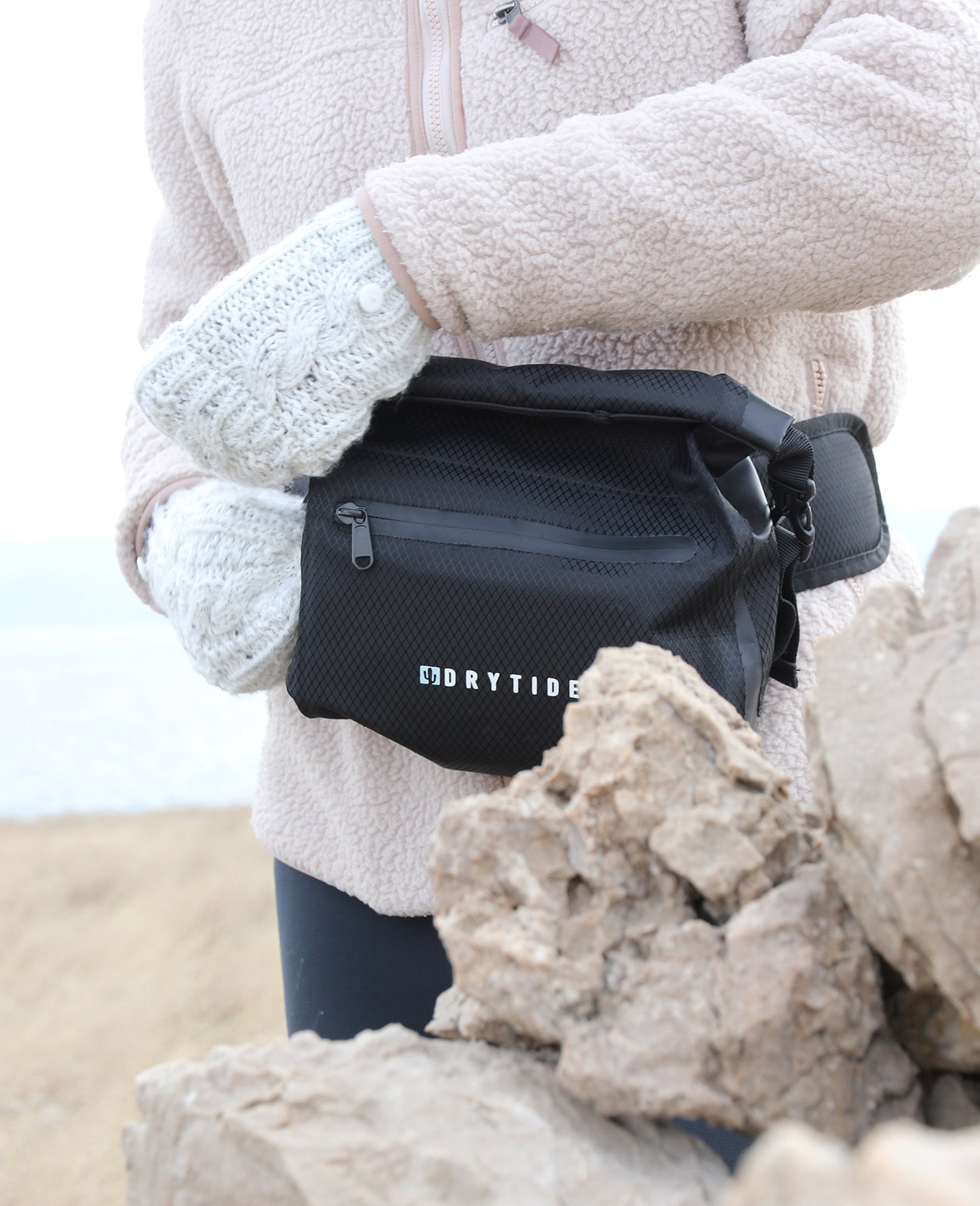 Waterproof waist bag for outdoor adventures and water activities.